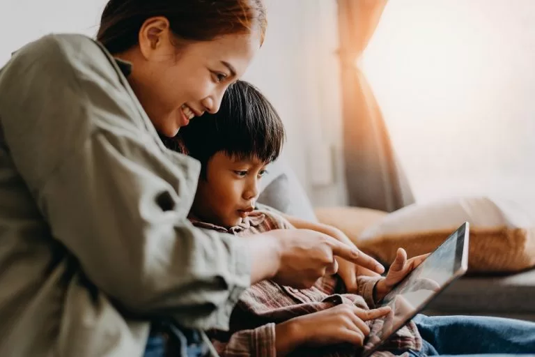 Happy mother who managed to get coverage for her son even with pre-existing medical conditions